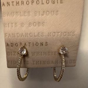 Never worn gold hoop earrings by Anthropologie.